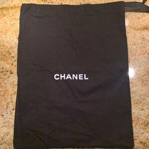 CHANEL Black Fabric Drawstring Pouch with White Logo